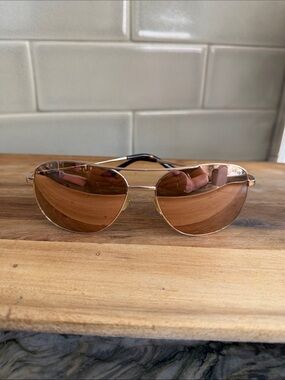 Aviator  Revo brand Sunglasses with Brown Mirrored Lenses